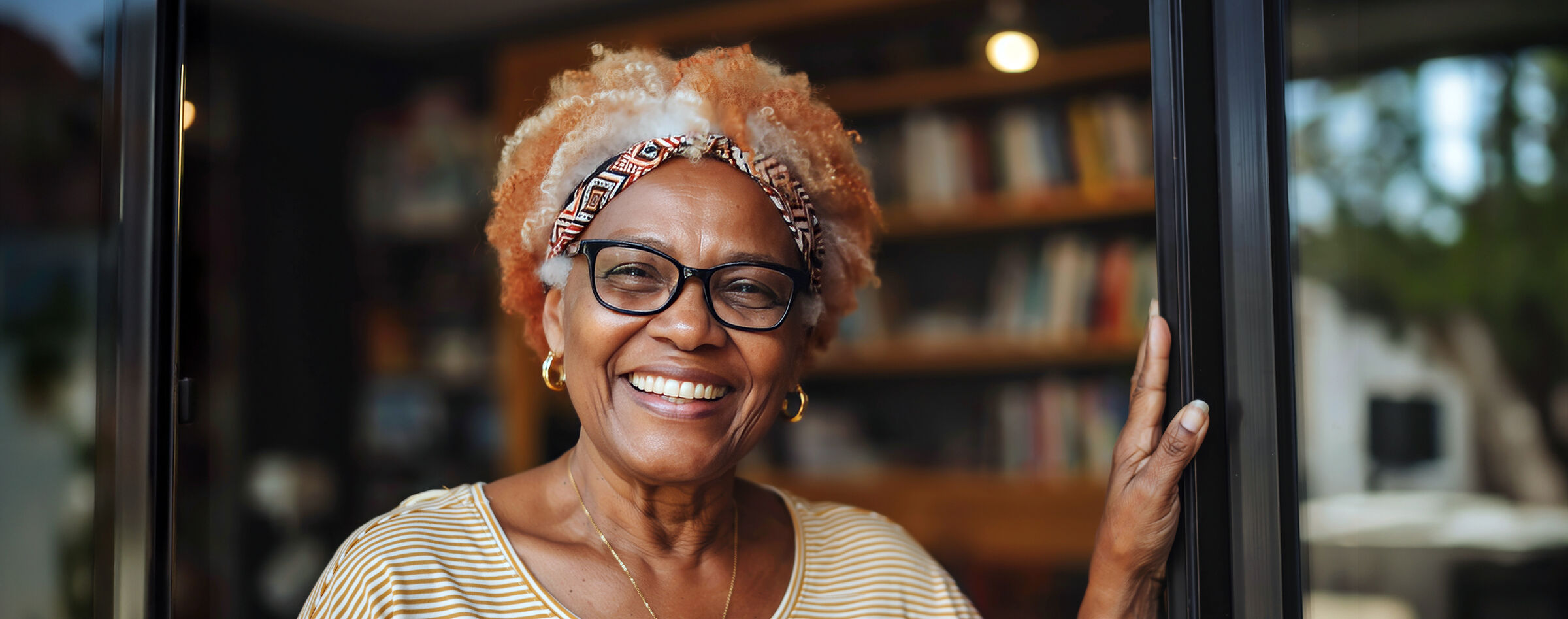 Smiling senior woman in a library lounge