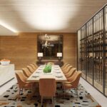 Rendering of the private dining room at The James with a long table, leather chairs and a glass-walled wine display